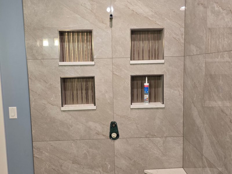 Gray Tile Walk-In Shower with Bench