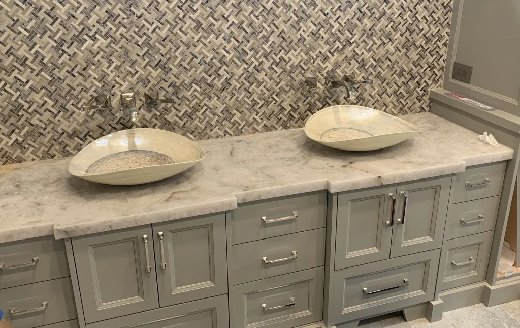 Gray Basketweave Master Bath with Marble Vanity photo 2